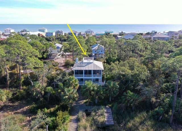 Property at 1017 E Pine Ave, St. George Island, FL 32328, 2 beds, 2.5 baths
