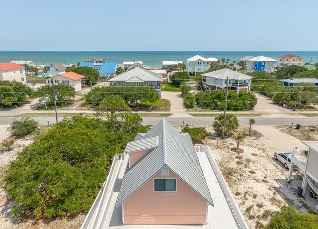 Property at 1133 W Gulf Beach Dr, St. George Island, FL 32328, 4 beds, 3 baths