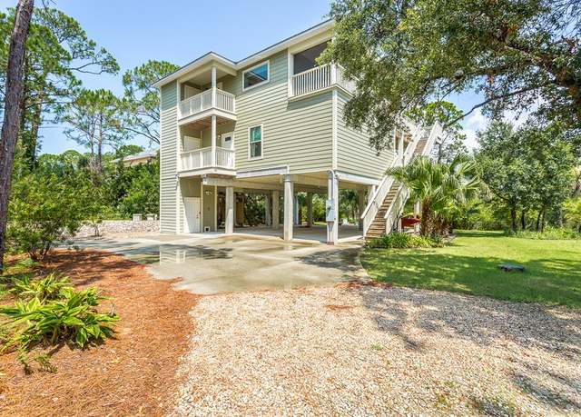 Property at 900 Bay Shore Dr, St. George Island, FL 32328, 5 beds, 4 baths
