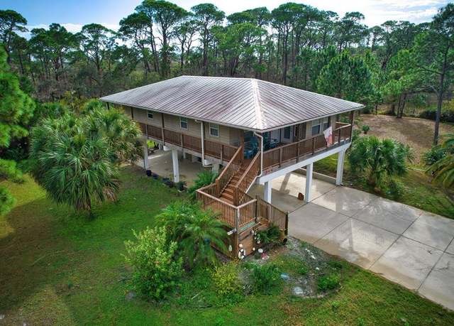 Property at 848 W Bay Shore Dr, St. George Island, FL 32328, 3 beds, 2.5 baths