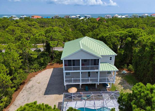 Property at 1701 Kingfisher Rd, St. George Island, FL 32328, 4 beds, 4.5 baths