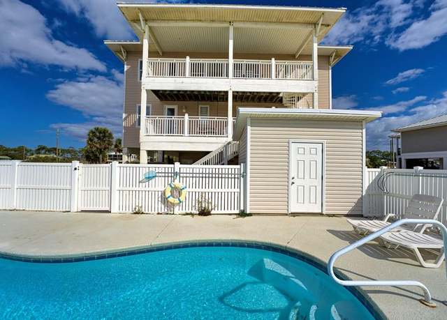 Property at 916 E Gulf Beach Dr, St. George Island, FL 32328, 4 beds, 4.5 baths