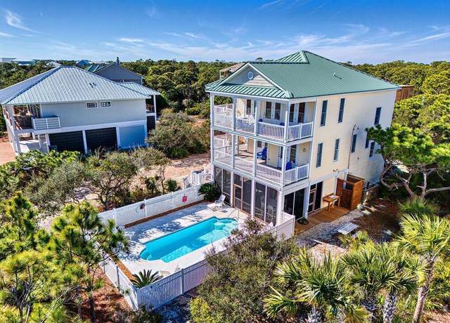 Property at 1956 Coral Reef Rd, St. George Island, FL 32328, 5 beds, 4.5 baths