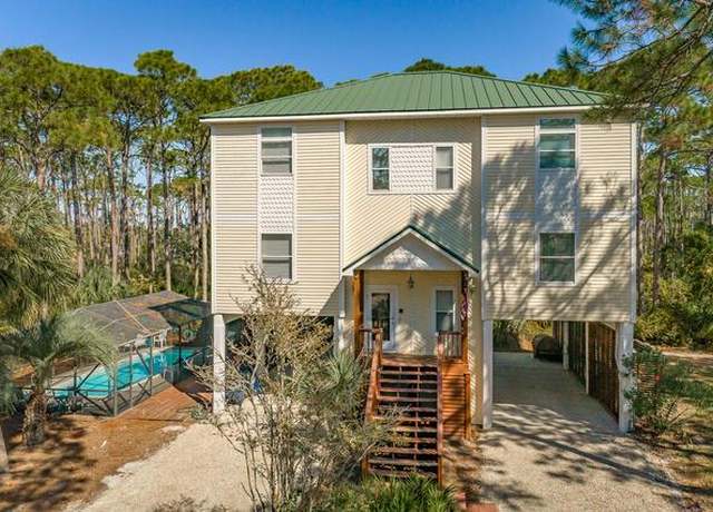 Property at 1605 Forsythia Trl, St. George Island, FL 32328, 4 beds, 3.5 baths