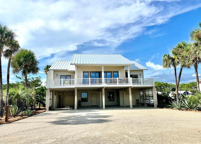Property at 517 E Gorrie Dr, St. George Island, FL 32328, 5 beds, 5 baths