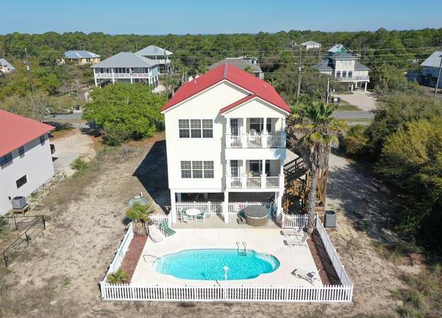 Property at 1116 W Gulf Beach Dr, St. George Island, FL 32328, 4 beds, 3.5 baths