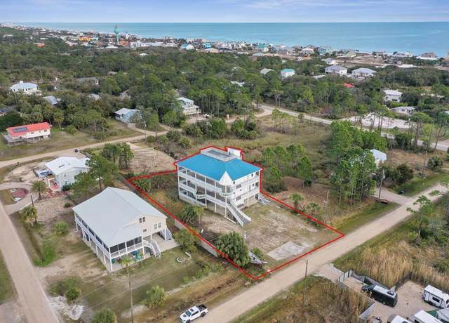 Property at 315 Quinn St, St. George Island, FL 32328, 5 beds, 7.5 baths
