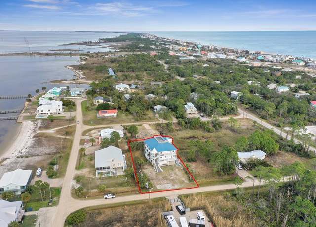 Property at 315 Quinn St, St. George Island, FL 32328, 5 beds, 7.5 baths