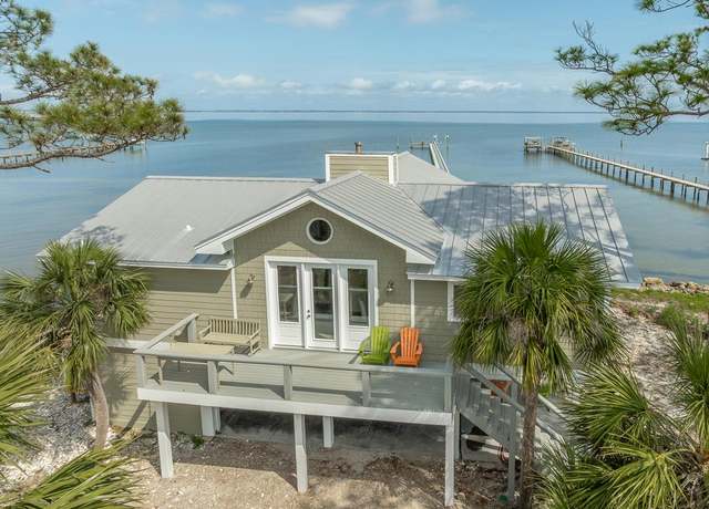 Property at 1371 E Gulf Beach Dr, St. George Island, FL 32328, 3 beds, 2 baths