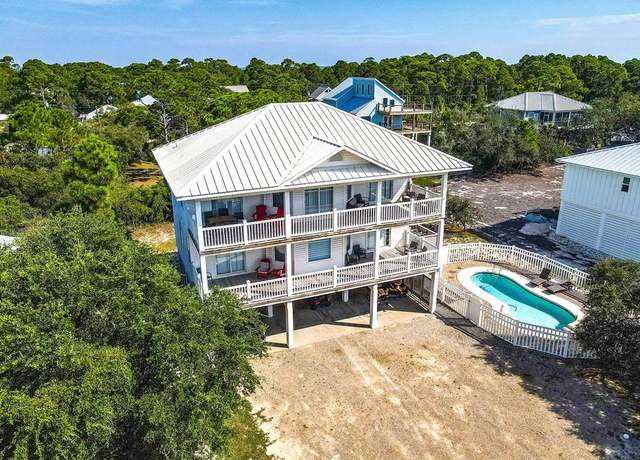 Property at 949 West Gulf Beach Dr, St. George Island, FL 32328, 4 beds, 4.5 baths