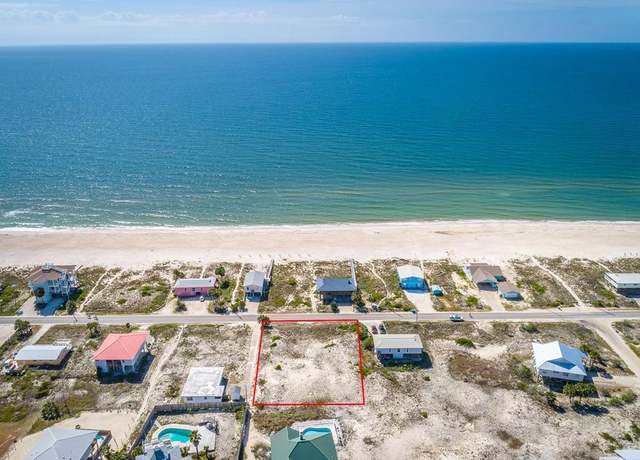Property at 725 E Gorrie Dr, St. George Island, FL 32328, 4 beds, 4 baths