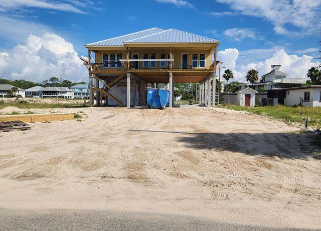 Property at 725 E Gorrie Dr, St. George Island, FL 32328, 4 beds, 4 baths