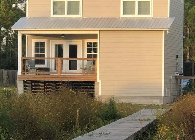 Property at 214 Lake Mckissack Ln, Carrabelle, FL 32322, 3 beds, 2.5 baths
