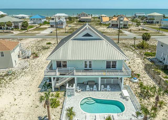 Property at 809 E Gulf Beach Dr, St. George Island, FL 32328, 4 beds, 3.5 baths