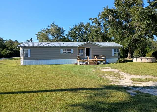 Property at 1220 Stone Mill Creek Rd, Wewahitchka, FL 32465, 3 beds, 2 baths