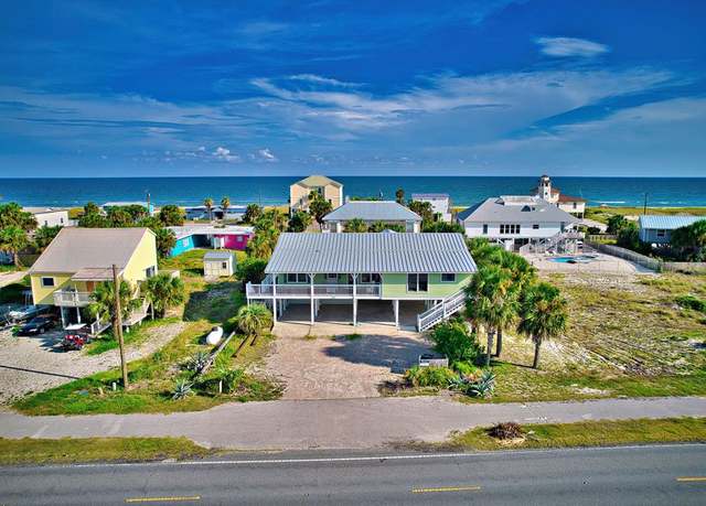 Property at 616 E Gulf Beach Dr, St. George Island, FL 32328, 5 beds, 4.5 baths