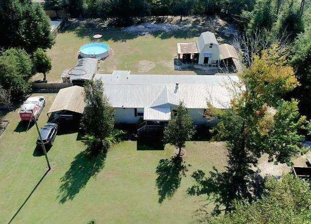 Property at 14721 Bonnie Girls Way, Southport, FL 32409, 4 beds, 2 baths