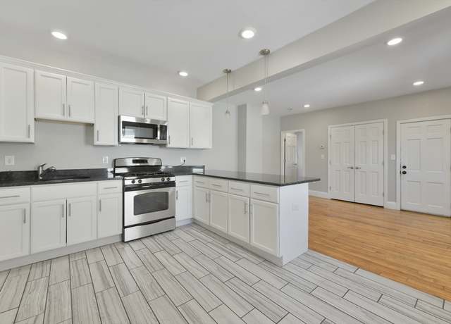Property at 10 Howell Ct, Chelsea, MA 02150, 5 beds, 2 baths