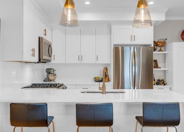 Property at 67-69 Cummins Hwy #302, Boston, MA 02131, 2 beds, 2 baths