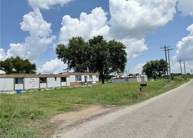 Property at 23062 Race Track Rd, Spiro, OK 74959, 5 beds, 3 baths
