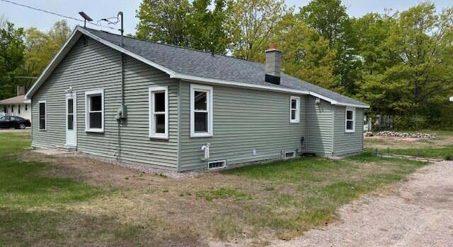 Photo of 5863 E 15 Mile Rd, Barbeau, MI 49710