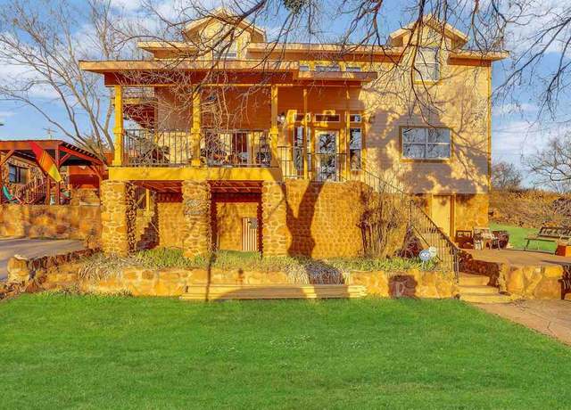 Property at 115 E Lake Dr, Medicine Park, OK 73557, 4 beds, 3 baths