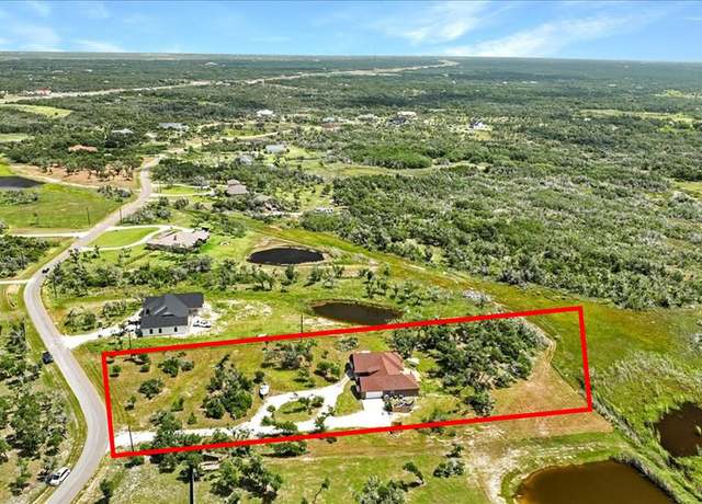 Property at 210 Coastal Wildwood Dr, Rockport, TX 78328, 4 beds, 3 baths