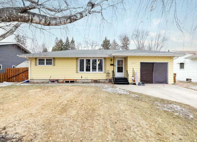 Property at 1807 14th Ave NW, East Grand Forks, MN 56721, 4 beds, 2 baths