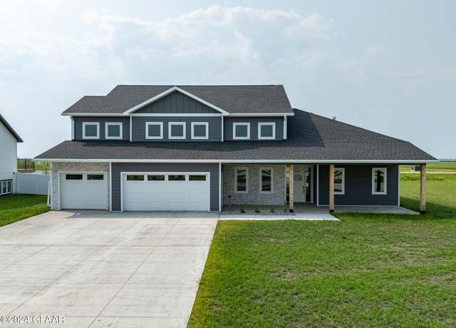 Property at 6046 W Prairiewood DR Dr, Grand Forks, ND 58201, 5 beds, 3 baths