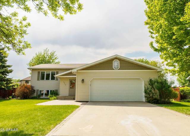 Property at 2219 12th Ave NW, East Grand Forks, MN 56721, 4 beds, 2 baths