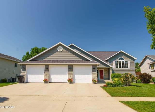 Property at 672 Mighty Acres Dr, Grand Forks, ND 58201, 5 beds, 3 baths