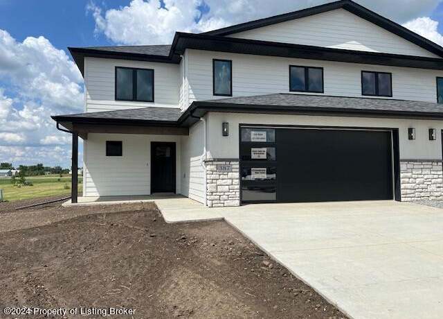 Property at 387 Center St, South Heart, ND 58655, 3 beds, 2.5 baths