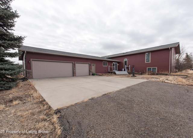 Property at 516 1st Ave SW, Dickinson, ND 58601, 5 beds, 3 baths