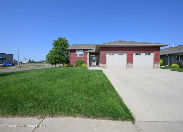 Property at 115 18th Ave W, Dickinson, ND 58601, 4 beds, 3 baths