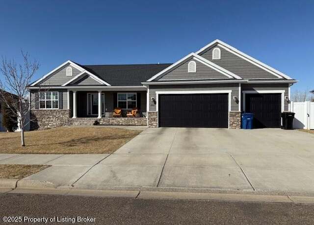 Property at 2483 Country Oak Dr, Dickinson, ND 58601, 5 beds, 3 baths