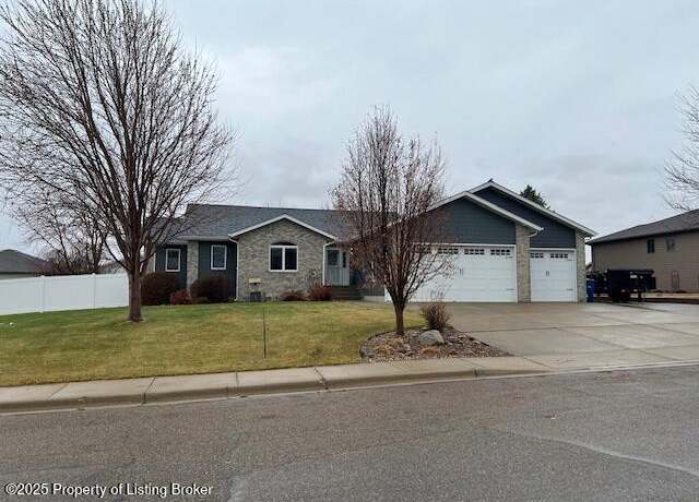Property at 2041 5th St W, Dickinson, ND 58601, 5 beds, 3 baths