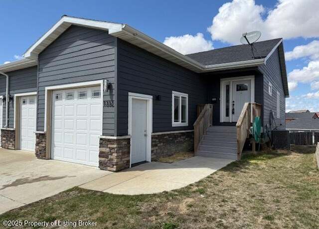 Property at 1332 23rd St W, Dickinson, ND 58601, 4 beds, 3 baths