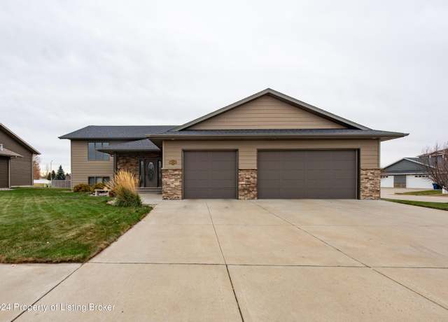 Property at 2433 4th St W, Dickinson, ND 58601, 4 beds, 3 baths