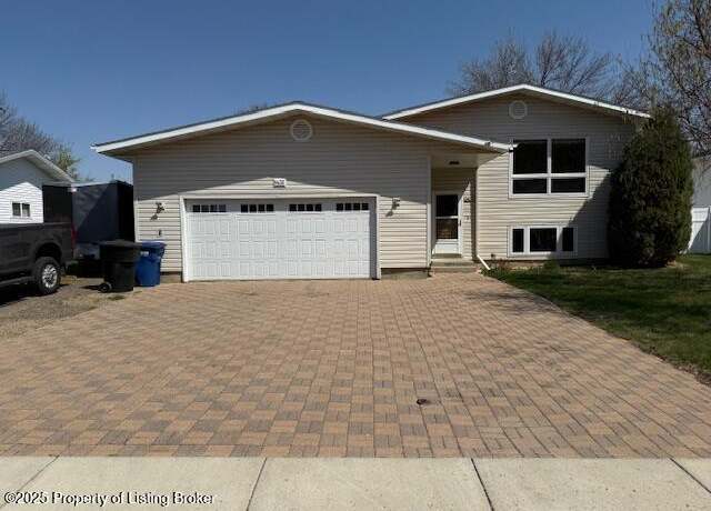 Property at 1432 1st Ave E, Dickinson, ND 58601, 5 beds, 2 baths