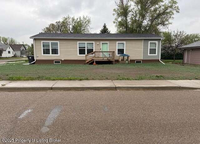 Property at 245 2nd Ave SW, Dickinson, ND 58601, 4 beds, 2 baths