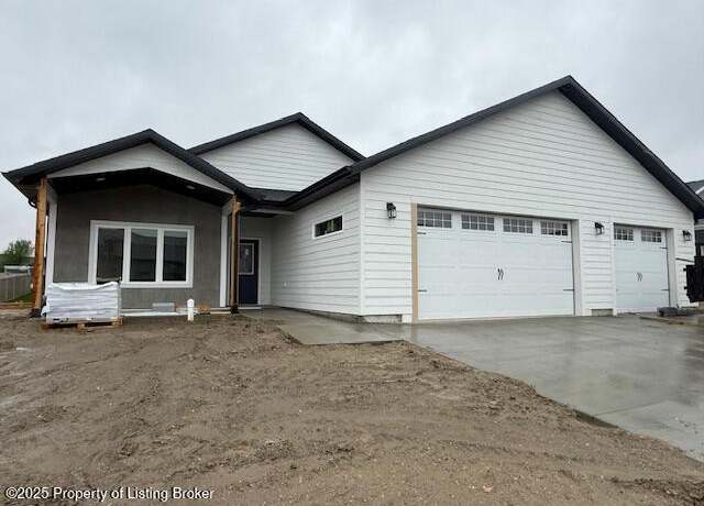 Property at 1180 24th St W, Dickinson, ND 58601, 3 beds, 2 baths