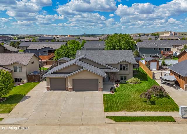 Property at 2398 4th St W, Dickinson, ND 58601, 4 beds, 3 baths