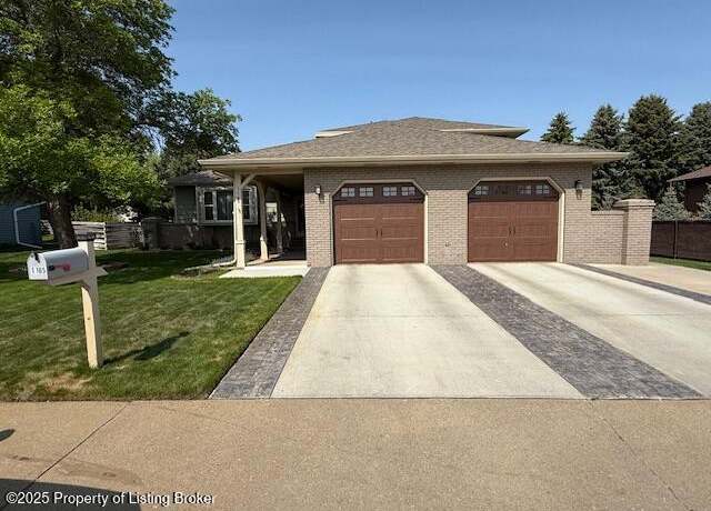 Property at 1165 10th Ave W, Dickinson, ND 58601, 4 beds, 4 baths