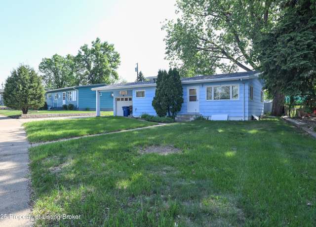 Property at 1038 Lincoln St, Dickinson, ND 58601, 4 beds, 2 baths