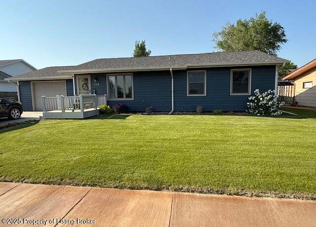 Property at 848 21st St W, Dickinson, ND 58601, 4 beds, 3 baths