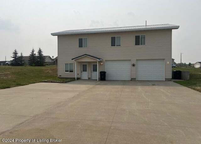 Property at 307 6th St NW, Belfield, ND 58622, 5 beds, 3 baths