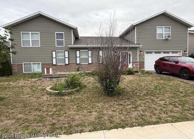 Property at 511 Highlands Ave, Dickinson, ND 58601, 3 beds, 3 baths