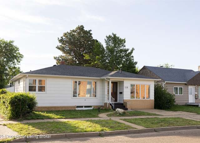 Property at 128 11th Ave W, Dickinson, ND 58601, 4 beds, 3 baths