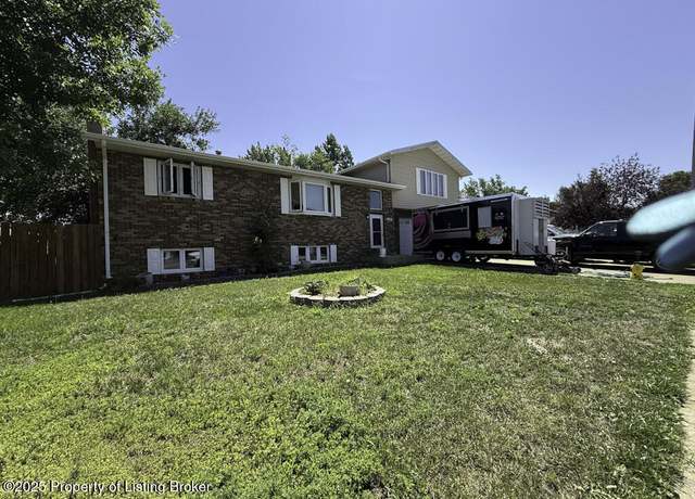 Property at 649 2nd Ave SE, Dickinson, ND 58601, 4 beds, 3 baths