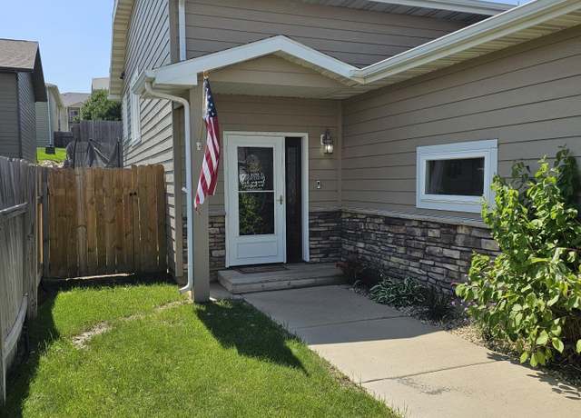 Property at 1213 24th St W, Dickinson, ND 58601, 4 beds, 3 baths